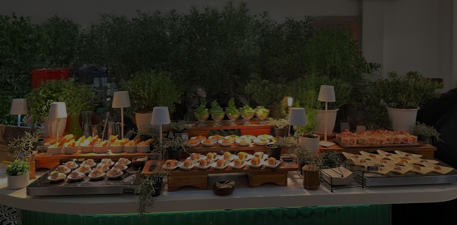 Rows of freshly plated canapés prepared by Annielito's kitchen team